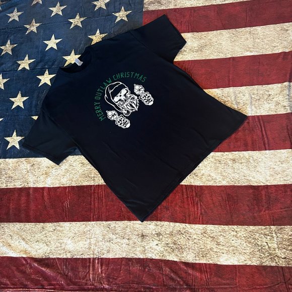 This Merry Outlaw Christmas Santa T-shirt is perfect for anyone who wants to add - Picture 1 of 4
